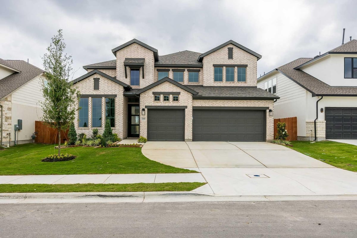 View 241 Sheepdog DR in Lariat 241 Sheepdog DR - front exterior - Luxury home in Lariat, Liberty Hill, TX