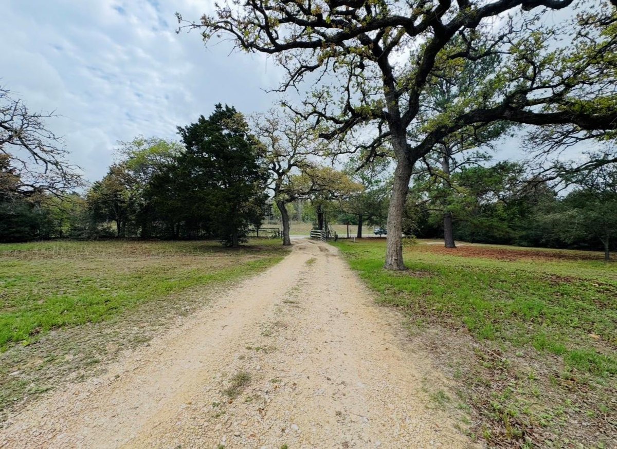 View 2410 N State Highway 95 in Dykes, Dennis 2410 N State Highway 95 - front exterior - Luxury home in Dykes, Dennis, Bastrop, TX