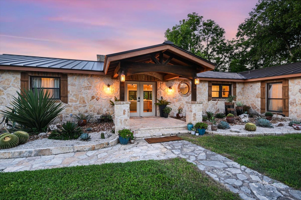 View 2411 Spoke Hollow RD in Hidden Valley Estates 2411 Spoke Hollow RD - property photo 1 - Luxury home in Hidden Valley Estates, Wimberley, TX