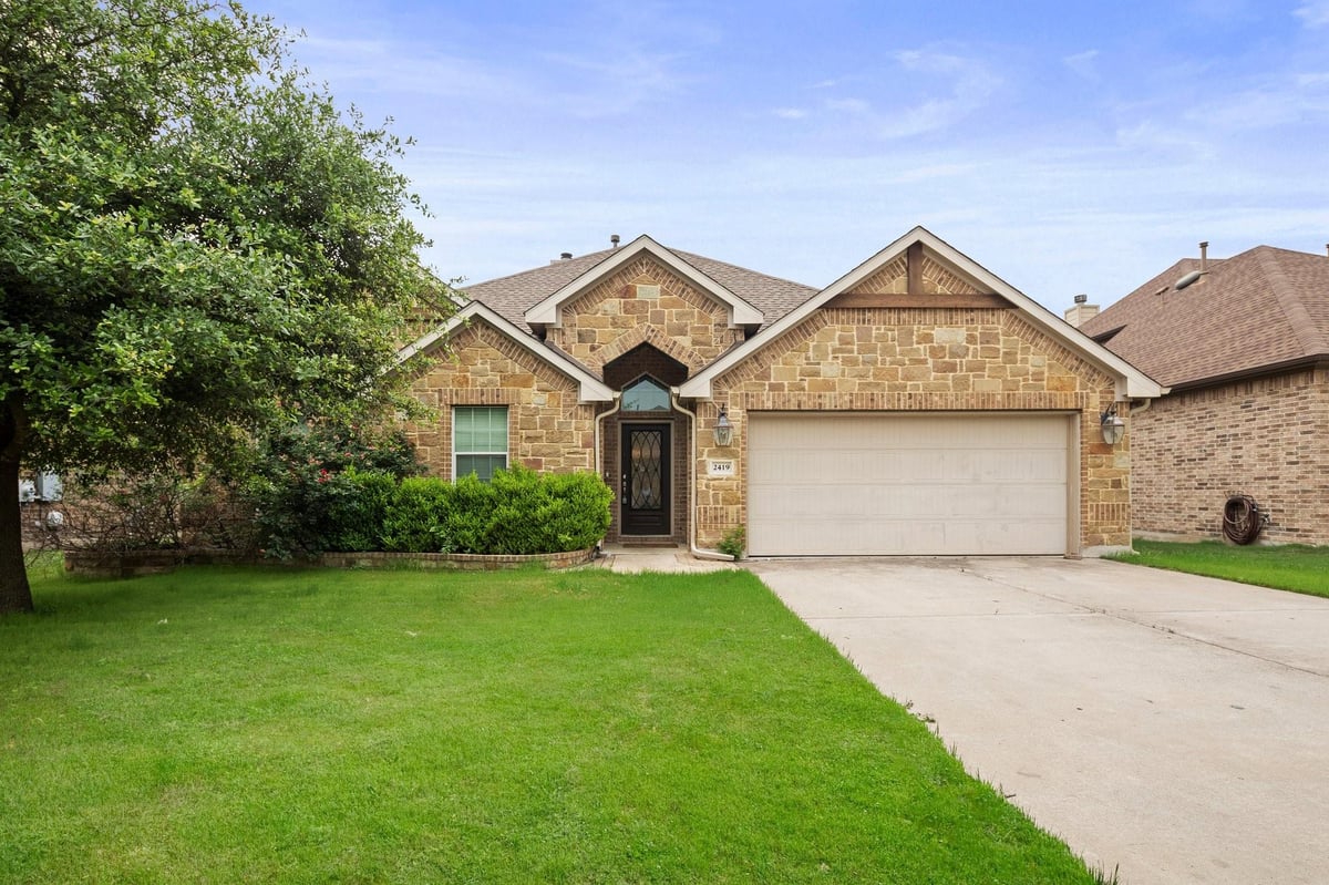 View 2419 Sweetwater Ln in Whitestone Oaks At Anderson 2419 Sweetwater Ln - front exterior - Luxury home in Whitestone Oaks At Anderson, Cedar Park, TX