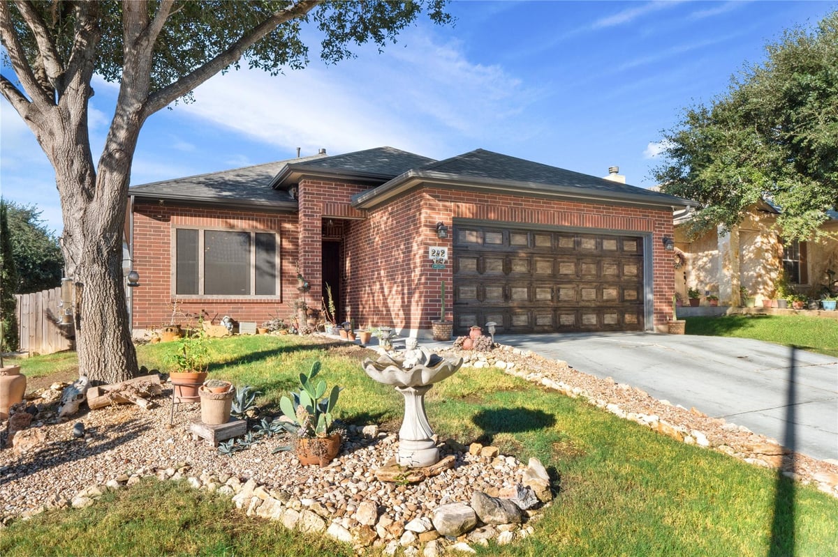 View 242 Coach DR in Shadow Creek Ph 1 Sec 6 242 Coach DR - front exterior - Luxury home in Shadow Creek Ph 1 Sec 6, Buda, TX