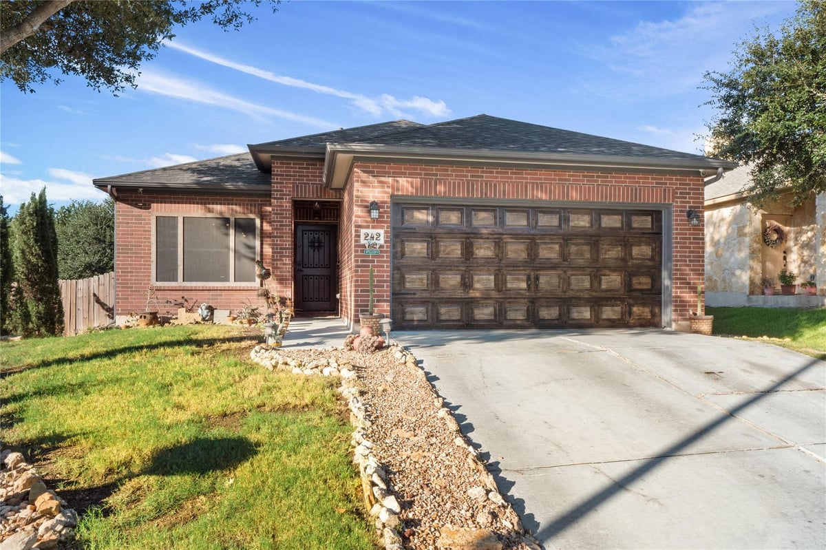 View 242 Coach DR in Shadow Creek Ph 1 Sec 6 242 Coach DR - front exterior - Luxury home in Shadow Creek Ph 1 Sec 6, Buda, TX
