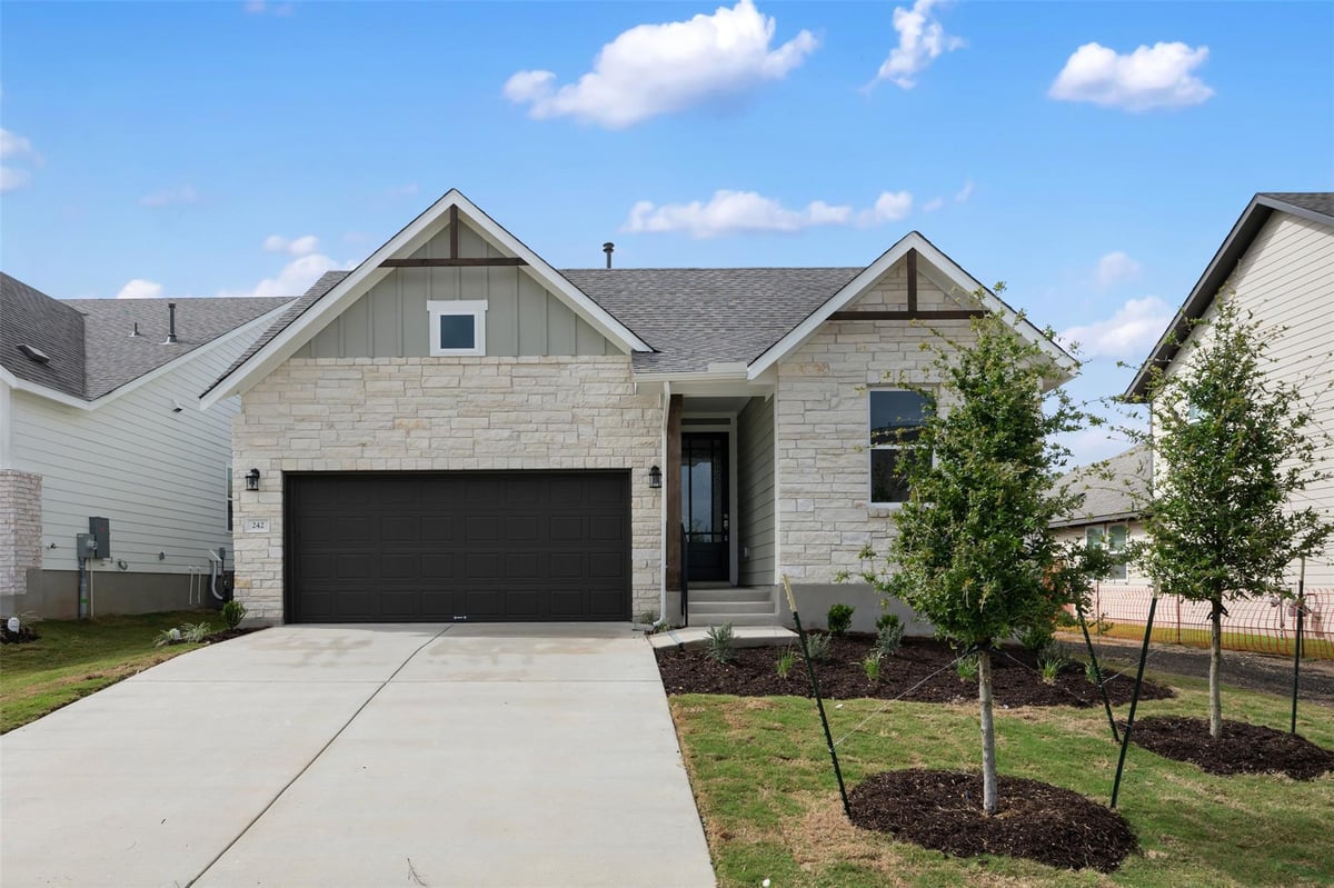 View 242 Crater Lake Dr in Cannon Ranch Sub Ph 2 242 Crater Lake Dr - front exterior - Luxury home in Cannon Ranch Sub Ph 2, Dripping Springs, TX