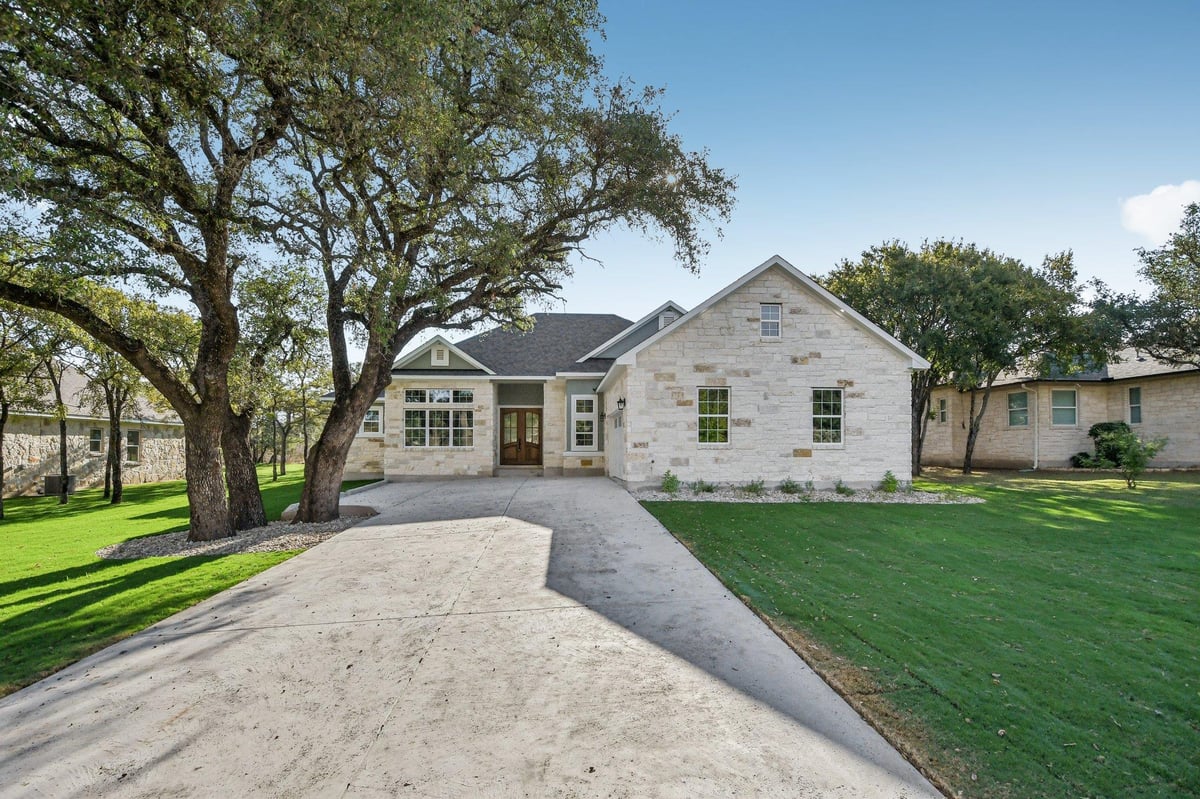 View 242 Sunday Dr in Ranch at Delaware Creek 242 Sunday Dr - front exterior - Luxury home in Ranch at Delaware Creek, Burnet, TX
