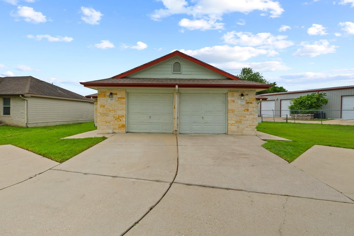 Primary bedroom at 243-245 Marvin Cv - Sturm Parke, Hutto, TX