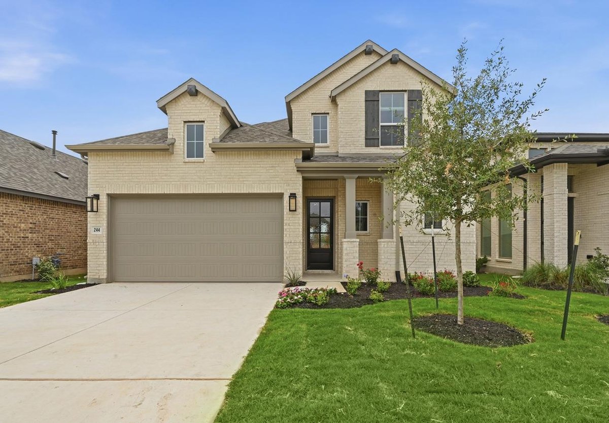 View 244 Basket Flower LOOP in 6 Creeks at Waterridge 244 Basket Flower LOOP - front exterior - Luxury home in 6 Creeks at Waterridge, Kyle, TX