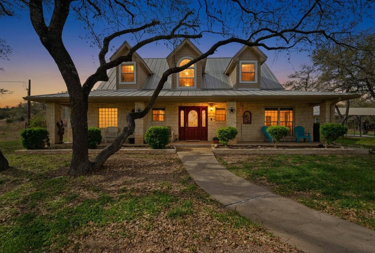 View 24415 Singleton Bend RD in English J 24415 Singleton Bend RD - front exterior - Luxury home in English J, Marble Falls, TX