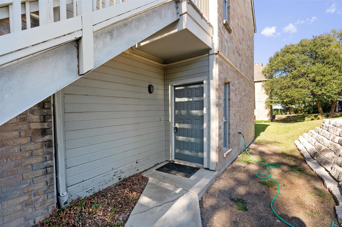 View 2450 Wickersham LN Unit #101 in Chamonix Condo Amd 2450 Wickersham LN Unit #101 - property photo 1 - Luxury home in Chamonix Condo Amd, Austin, TX