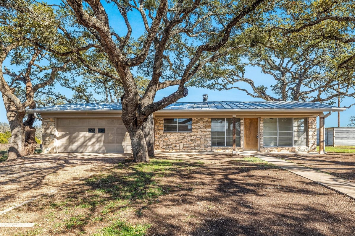 View 24503 Ranch Road 12 Unit #D in William Cockburn 24503 Ranch Road 12 Unit #D - front exterior - Luxury home in William Cockburn, Dripping Springs, TX