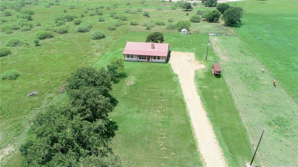 View 2452 County Road 226 2452 County Road 226 - front exterior - Luxury home in Giddings, TX