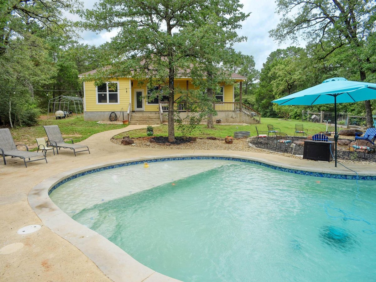 View 247 Campfire WAY in La Reata Ranch 247 Campfire WAY - property photo 1 - Luxury home in La Reata Ranch, Smithville, TX