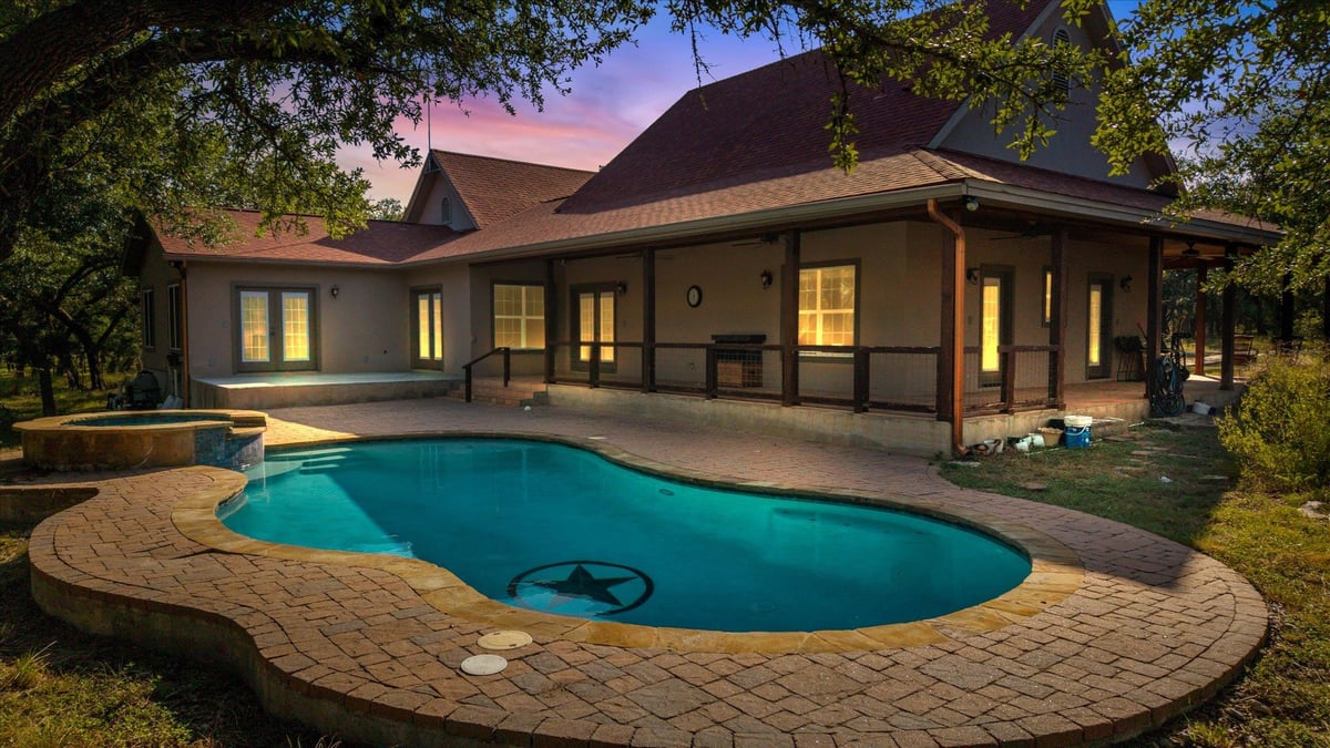 View 2471 Oak Run Dr in River Oaks Of Wimberley Unit 5 2471 Oak Run Dr - front exterior - Luxury home in River Oaks Of Wimberley Unit 5, Wimberley, TX