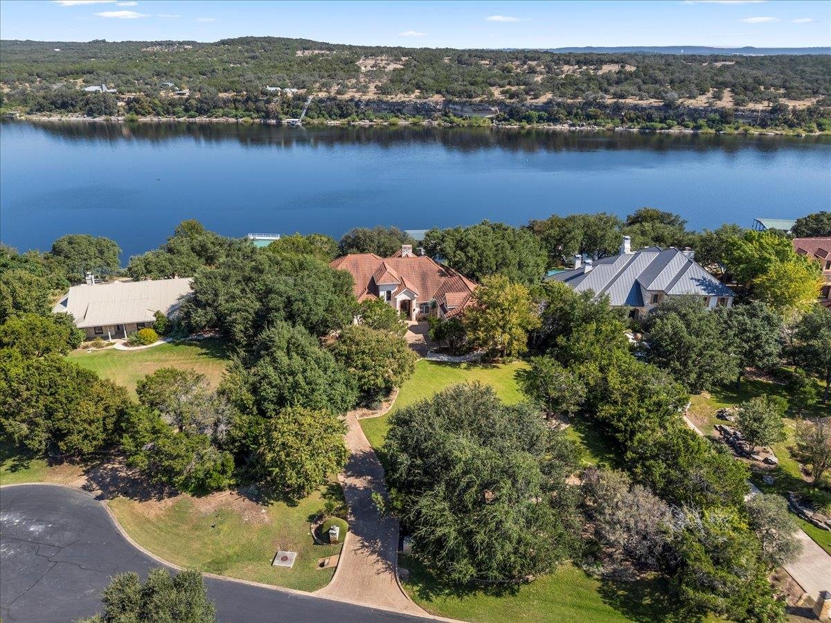 24729 Travis Lakeside Cv - front exterior - Luxury home in Travis Lakeside Ph 01, Spicewood, TX
