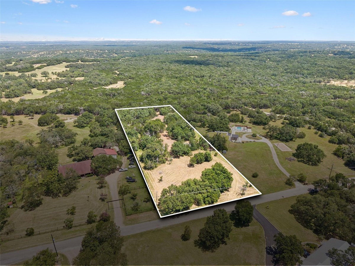 View 249 Grande ST in Los Ranchos 249 Grande ST - property photo 1 - Luxury lot in Los Ranchos, Driftwood, TX