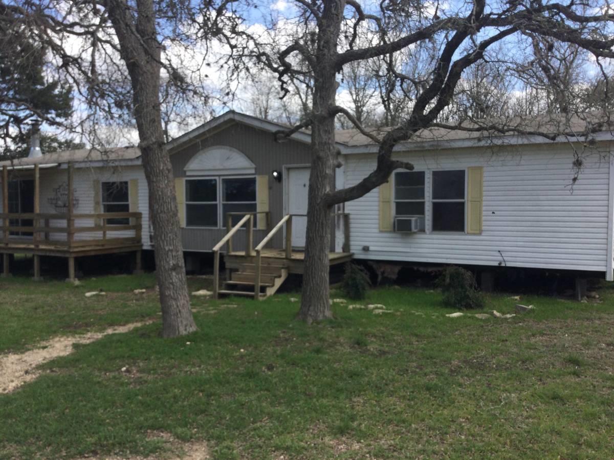 250  Rolling Oaks Dr - front exterior - Luxury home in Rolling Oaks Sec 2, Driftwood, TX