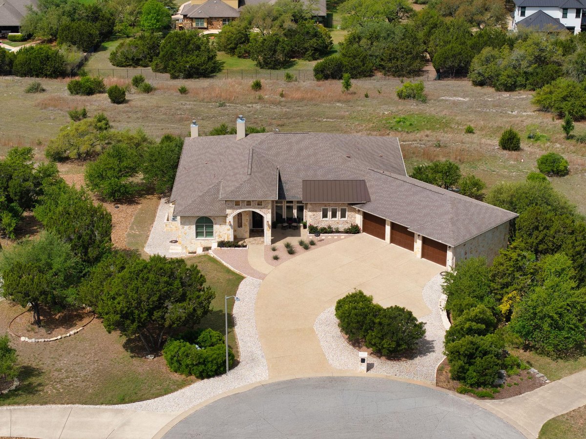 View 250 Sandy Creek CV in Rim Rock Ph 1 Sec 1 250 Sandy Creek CV - property photo 1 - Luxury home in Rim Rock Ph 1 Sec 1, Driftwood, TX