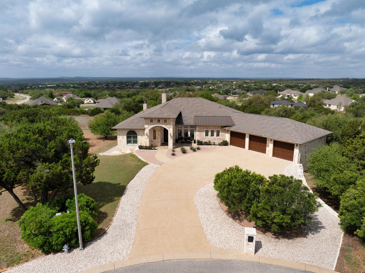 250 Sandy Creek Cv - front exterior - Luxury home in Rim Rock Ph 1 Sec 1, Driftwood, TX