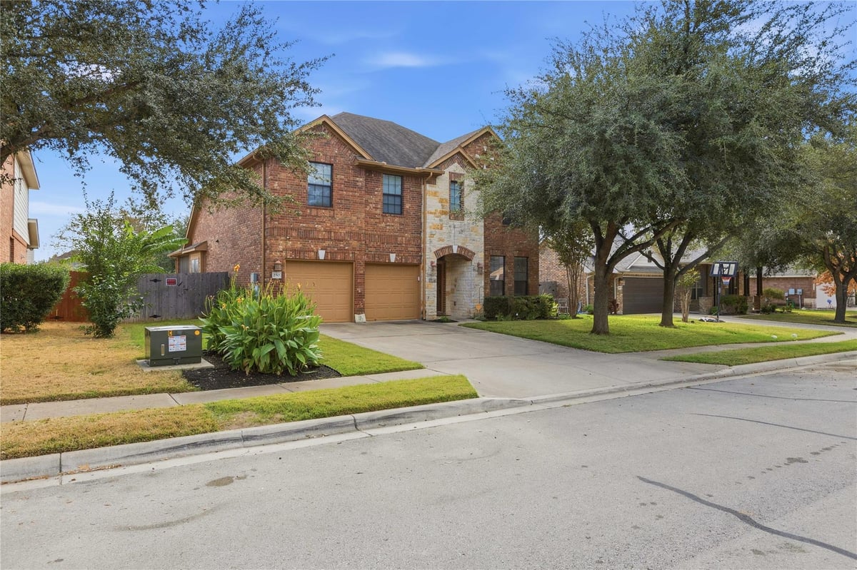 View 250 Tarbox Brown Dr in Garlic Creek West Ph Iii Sec 1 250 Tarbox Brown Dr - front exterior - Luxury home in Garlic Creek West Ph Iii Sec 1, Buda, TX