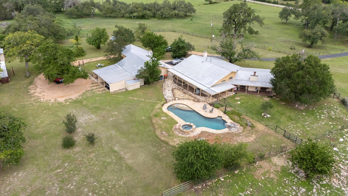 View 2501 Lone Man Mountain Rd in E Bohls 2501 Lone Man Mountain Rd - front exterior - Luxury home in E Bohls, Wimberley, TX