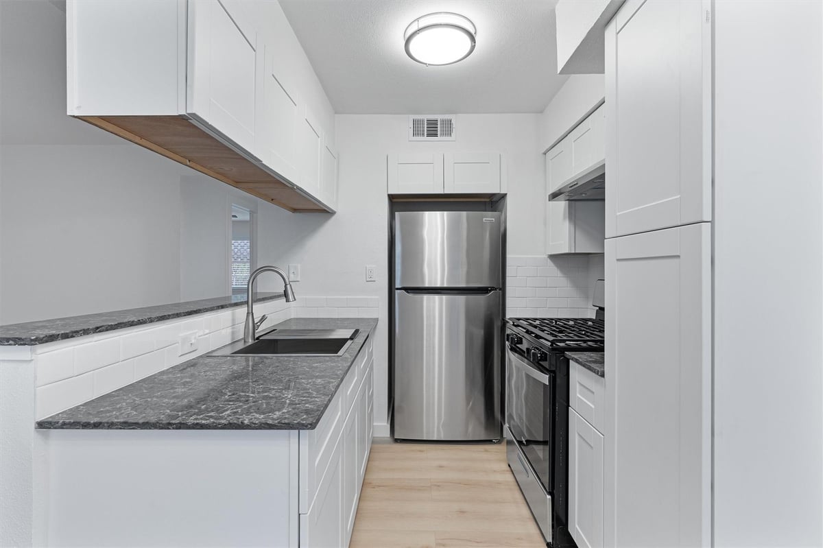 2501 Manor CIR Unit #A - property photo 1 - Luxury home in Manor Hills Sec 10, Austin, TX