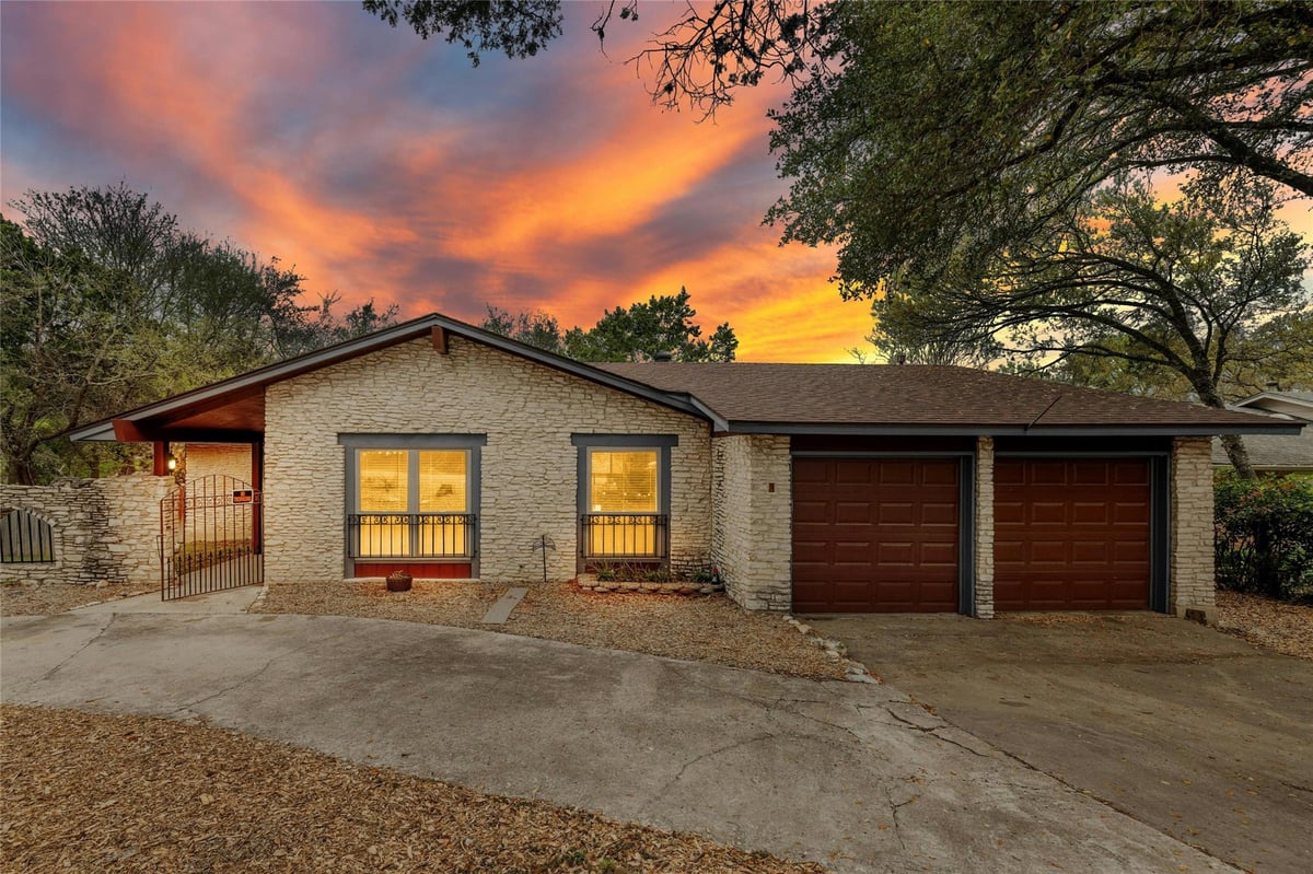 View 2502 Forest Bend Dr in Horseshoe Bend 2502 Forest Bend Dr - front exterior - Luxury home in Horseshoe Bend, Austin, TX