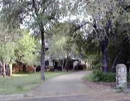 2503 Flora Cv - property photo 1 - Luxury home in TIMBERLINE IV  LOT 7, Austin, TX