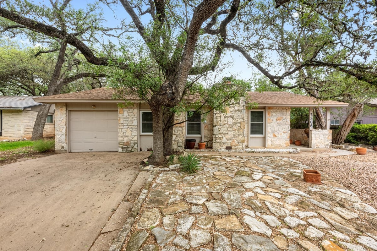 View 2506 Redleaf Ln in Whispering Oaks 2506 Redleaf Ln - front exterior - Luxury home in Whispering Oaks, Austin, TX