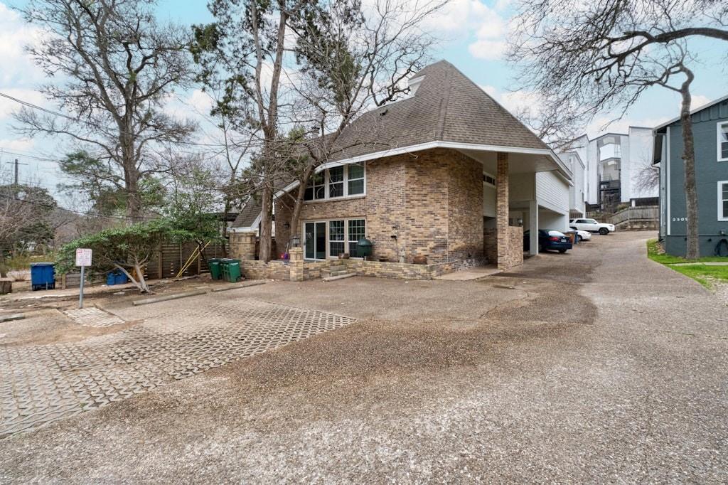 View 2507 Quarry Rd Unit #E in Twenty Five O Seven Quarry Roa 2507 Quarry Rd Unit #E - front exterior - Luxury home in Twenty Five O Seven Quarry Roa, Austin, TX