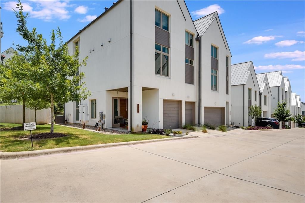View 2507 Sutherland St Unit #14B-1 in Walsh 360 Twnhms 2507 Sutherland St Unit #14B-1 - front exterior - Luxury home in Walsh 360 Twnhms, Austin, TX