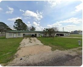 View 251 Zimmerman Ave Unit #A-B-C-D in John Wessels Sub 251 Zimmerman Ave Unit #A-B-C-D - front exterior - Luxury home in John Wessels Sub, Bastrop, TX
