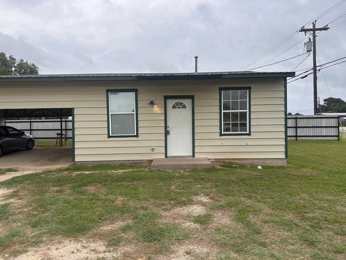 Primary bedroom at 251 Zimmerman Ave Unit #A - John Wessels Sub, Bastrop, TX