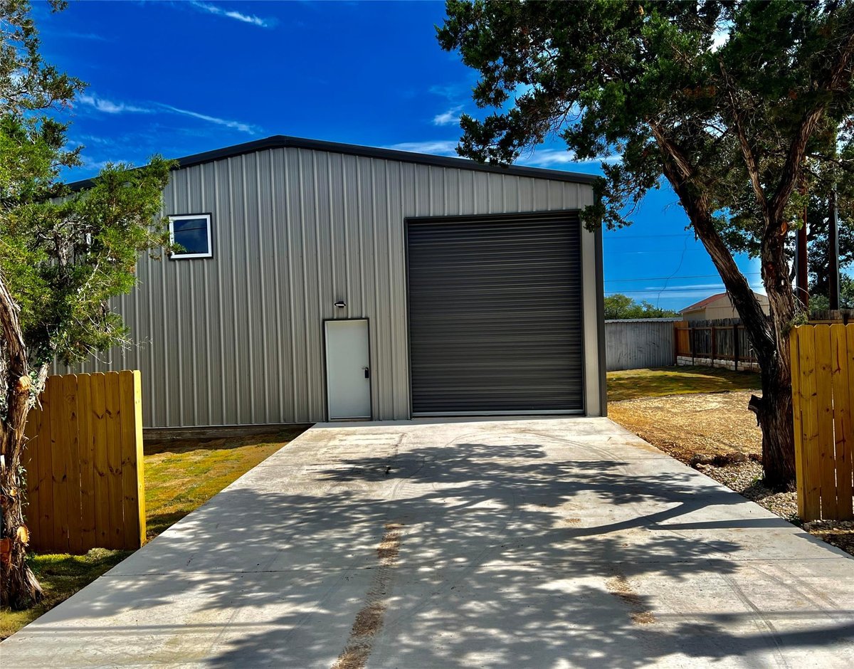 View 25102 WHITNEY Dr in Old Ferry Sec 03 25102 WHITNEY Dr - property photo 1 - Luxury home in Old Ferry Sec 03, Spicewood, TX