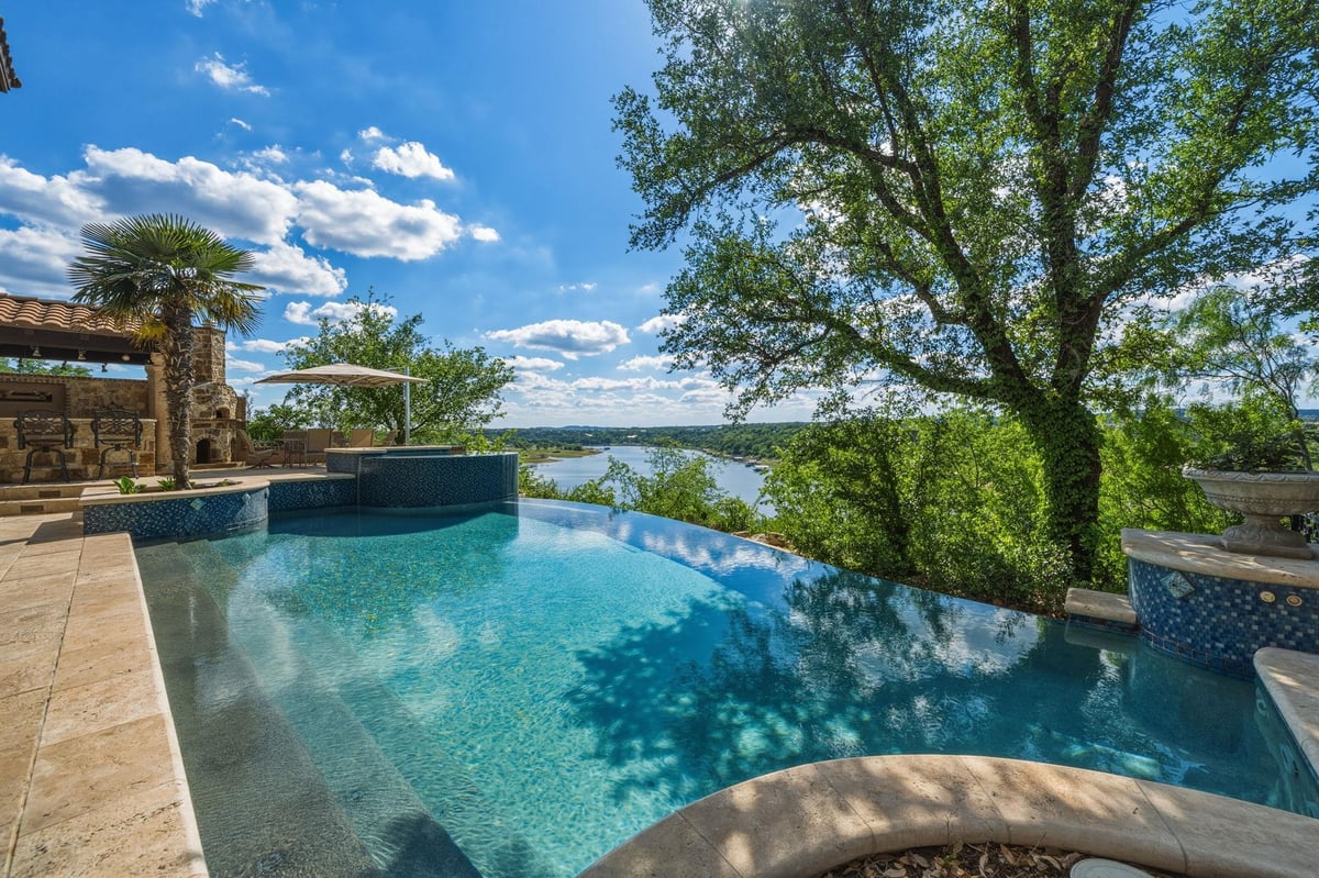 View 25110 River Rd in Pedernales Bend 25110 River Rd - front exterior - Luxury home in Pedernales Bend, Spicewood, TX