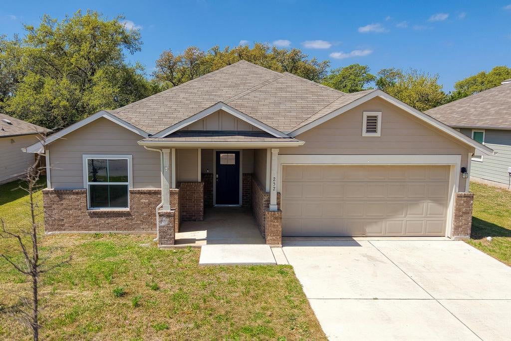 View 252 Bunting Ln in Dove Meadow 252 Bunting Ln - front exterior - Luxury home in Dove Meadow, Bertram, TX
