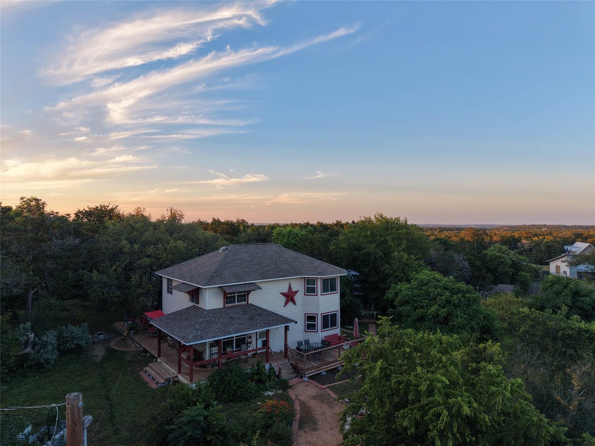 View 2525 S Rainbow Ranch RD in Rainbow Ranch 2525 S Rainbow Ranch RD - property photo 1 - Luxury home in Rainbow Ranch, Wimberley, TX
