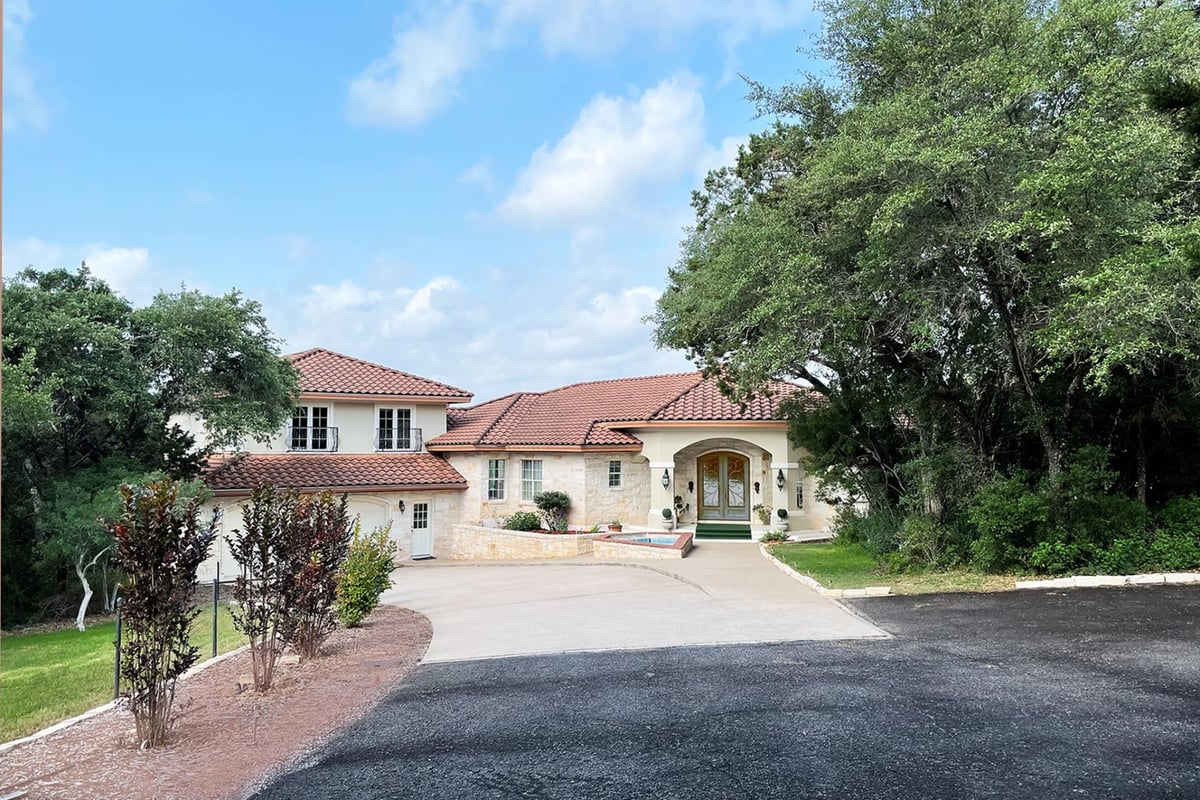25400 River Rd - front exterior - Luxury home in Pedernales Bend, Spicewood, TX