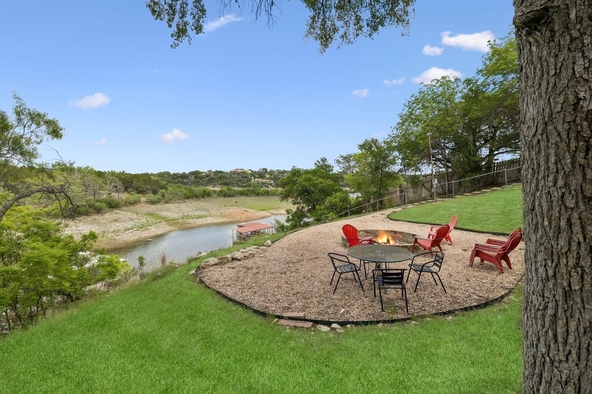 View 25420 Cove Dr in Point Pedernales 25420 Cove Dr - front exterior - Luxury home in Point Pedernales, Spicewood, TX