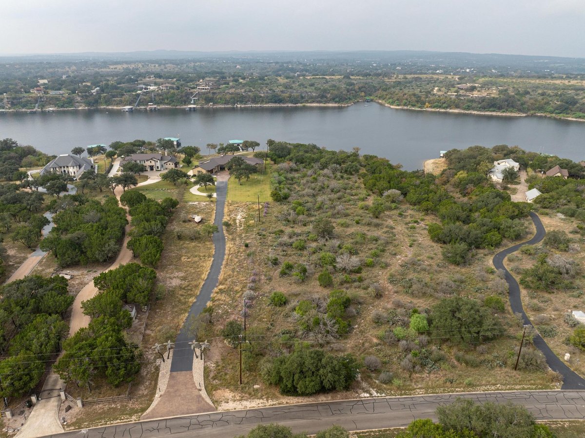 Primary bedroom at 25500 Colorado Canyon Dr - Chimney Oaks At Lake Travis SE, Marble Falls, TX
