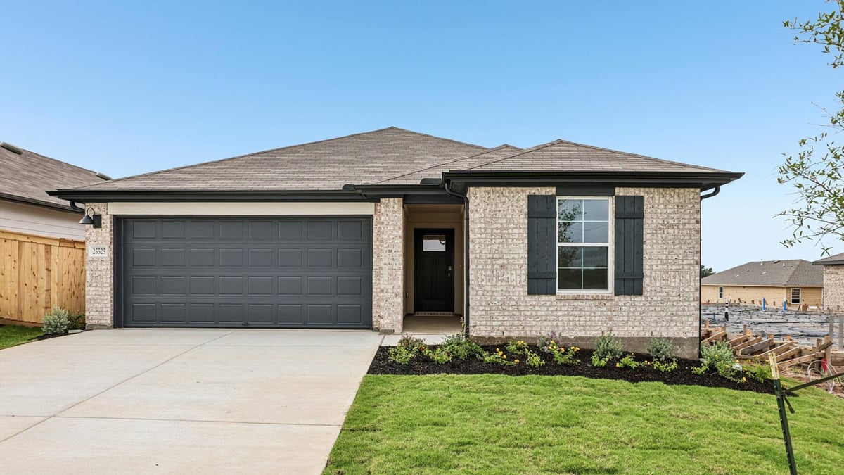 View 25525 Farmers Crop LN in Briarwood 25525 Farmers Crop LN - front exterior - Luxury home in Briarwood, Elgin, TX