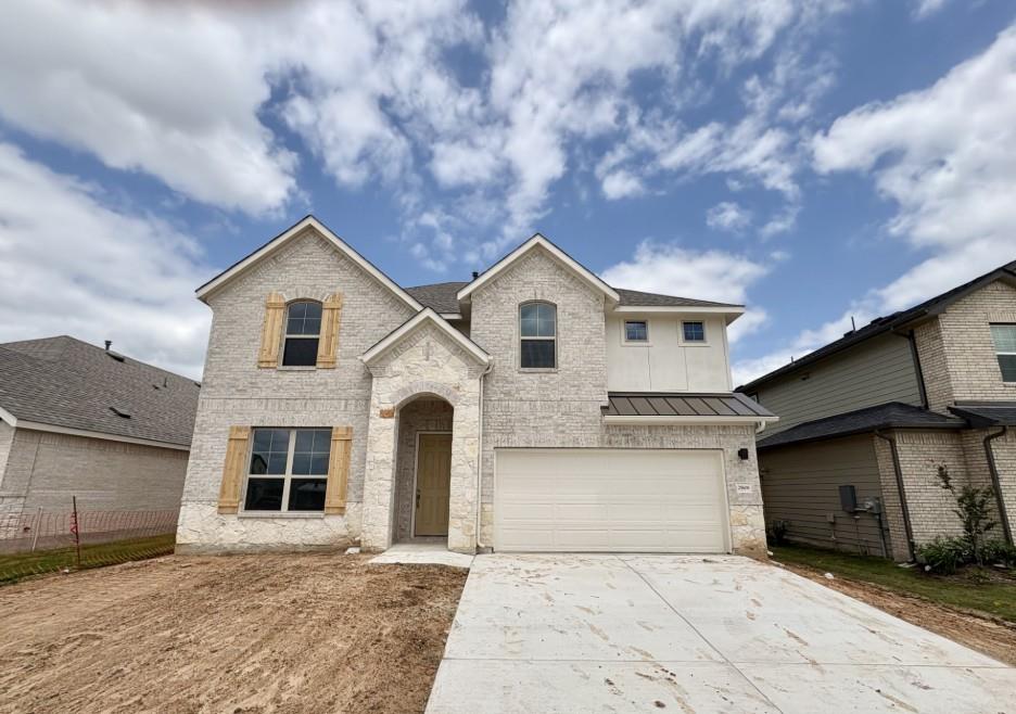 View 25608 Becky Bourn Ln in Briarwood 25608 Becky Bourn Ln - front exterior - Luxury home in Briarwood, Elgin, TX
