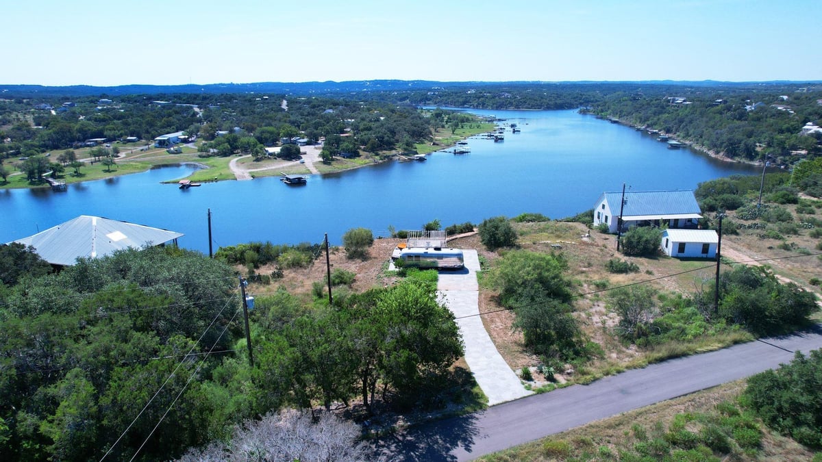 View 25625 Pedernales Point Dr in Paleface Pedernales 25625 Pedernales Point Dr - front exterior - Luxury lot in Paleface Pedernales, Spicewood, TX