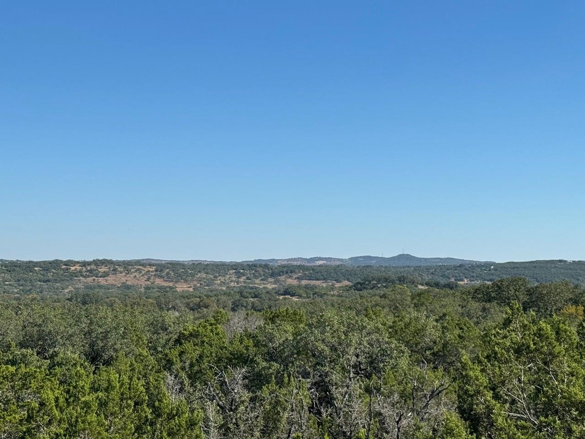 View 25723 Hamilton Pool Rd in None 25723 Hamilton Pool Rd - front exterior - Luxury lot in None, Round Mountain, TX
