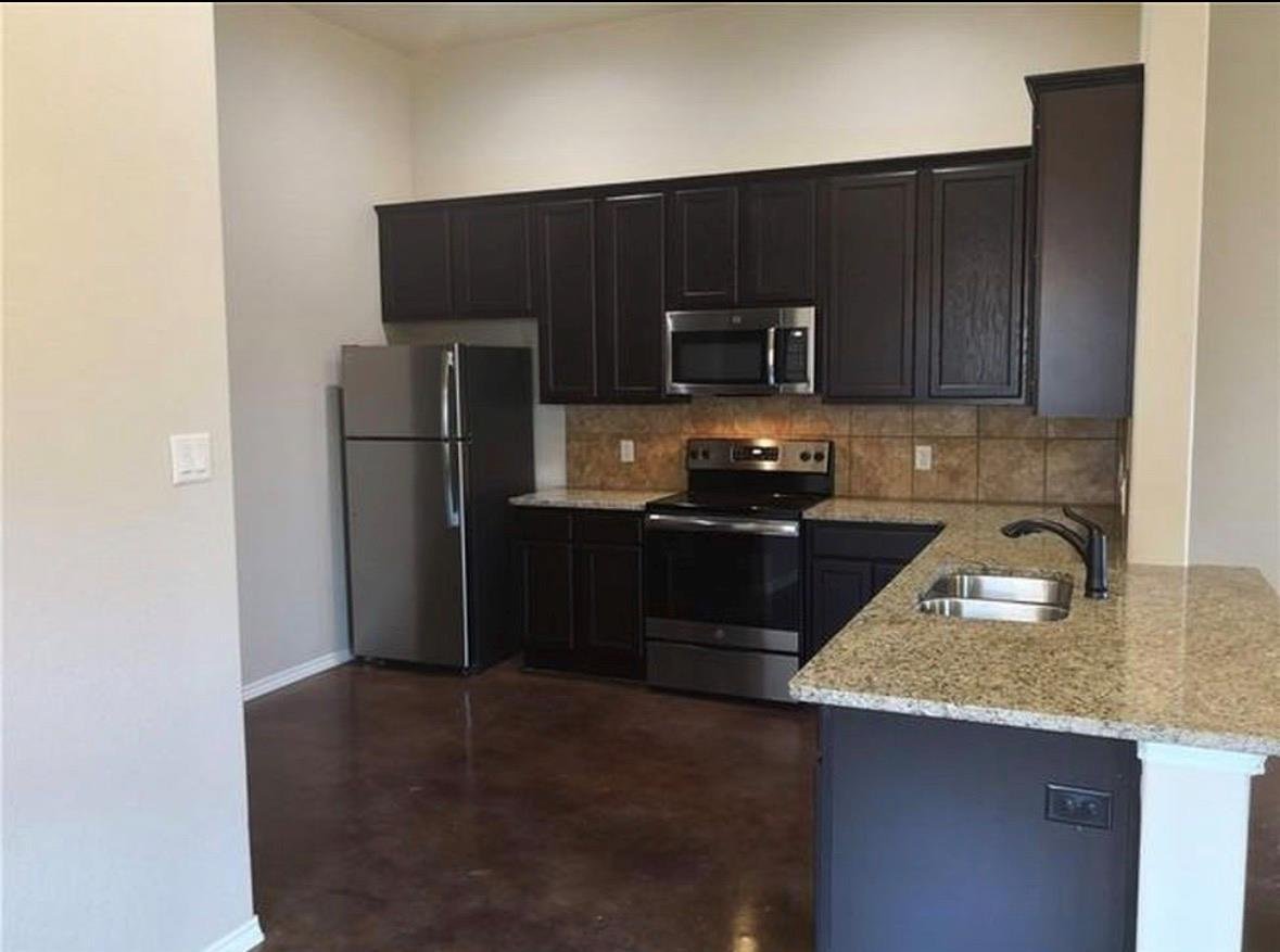 Living area at 258 Joanne Loop Unit #A & B - Windy Hill Sub -11 Ac, Buda, TX