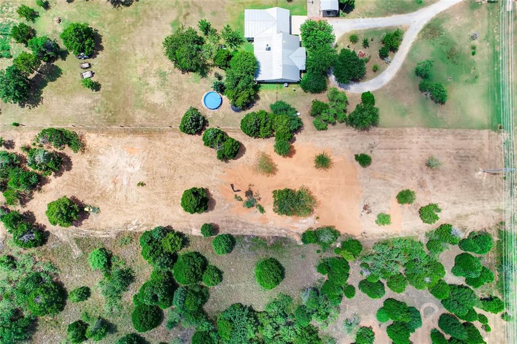 View 25866 FM 1704 25866 FM 1704 - front exterior - Luxury lot in Elgin, TX