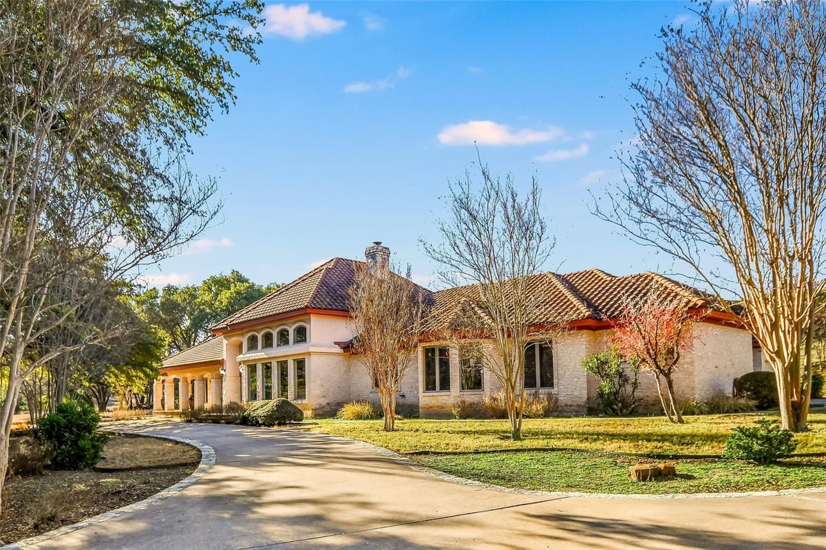 View 25909 Hamilton Pool Rd 25909 Hamilton Pool Rd - front exterior with 25909 Hamilton Pool Rd in Round Mountain - Luxury home in Round Mountain, TX
