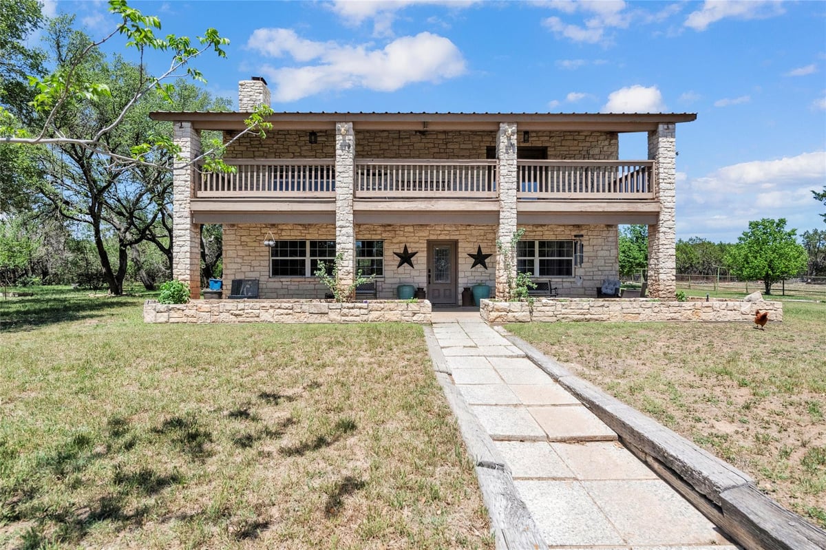 View 260 Flatrock TRL in A H Bean Surv #77 Abs # 137 260 Flatrock TRL - front exterior - Luxury home in A H Bean Surv #77 Abs # 137, Marble Falls, TX