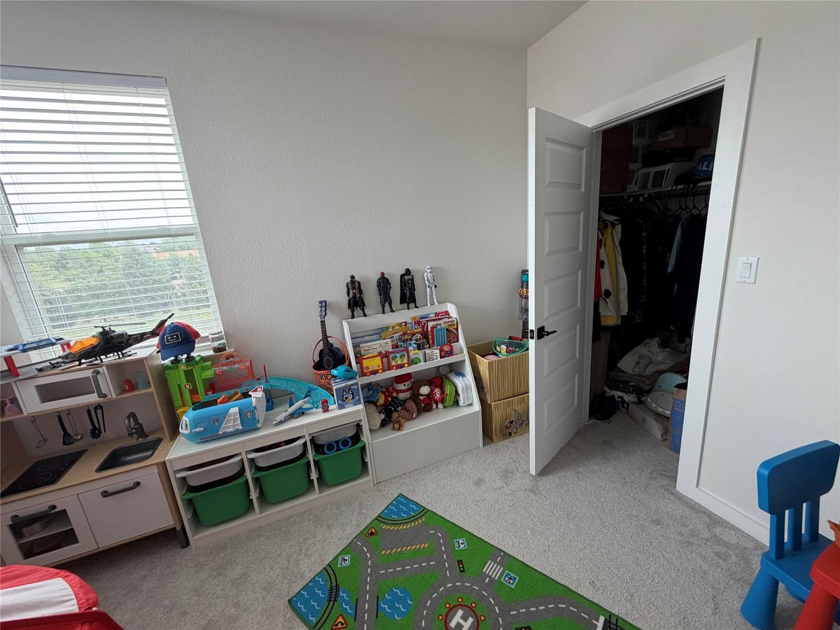 Primary bedroom at 2600 Gattis School Rd Unit #1401 - 3 bed 2 bath home