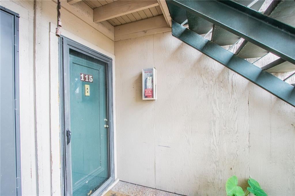 View 2600 Penny Ln Unit #115 in Victoria Square Condo 2600 Penny Ln Unit #115 - front exterior - Luxury home in Victoria Square Condo, Austin, TX