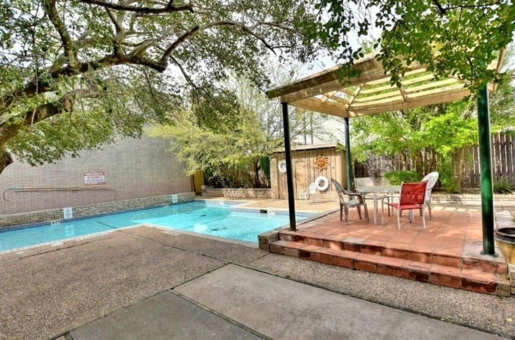 View 2600 Penny Ln Unit #206 in Victoria Square Condos 2600 Penny Ln Unit #206 - front exterior - Luxury home in Victoria Square Condos, Austin, TX