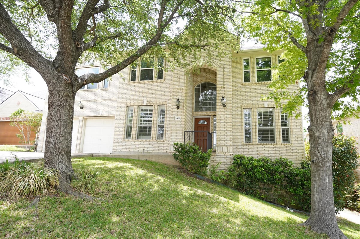 View 2604 Sterling Panorama Ct in Lake Pointe Sec 04 2604 Sterling Panorama Ct - front exterior - Luxury home in Lake Pointe Sec 04, Austin, TX